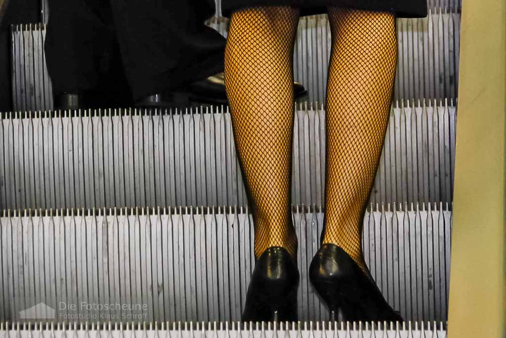 High Heels auf der Rolltreppe